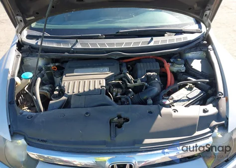 2007 Honda Civic Hybrid from USA, damaged, VIN JHMFA362X7S030847